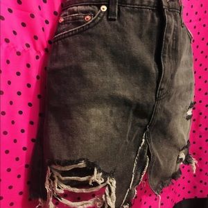 Free People size 27 denim distressed skirt.